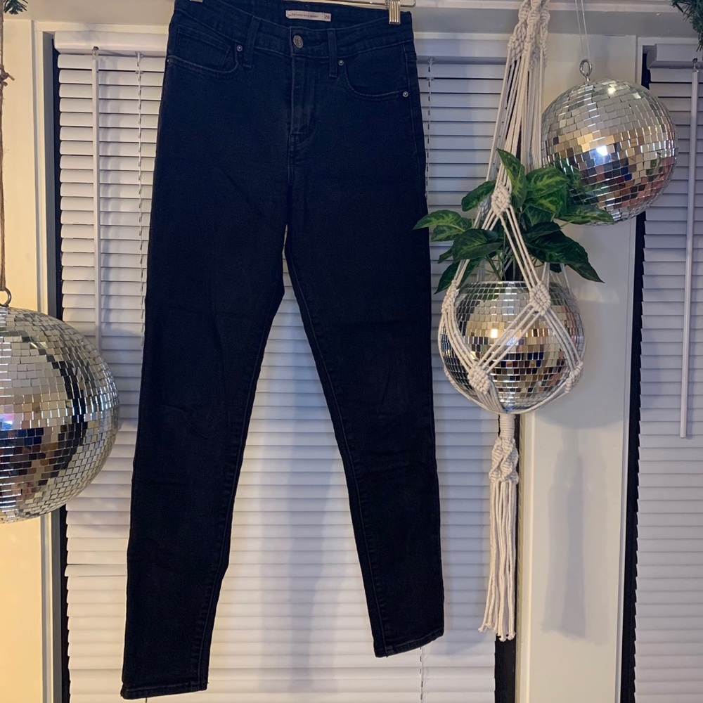 levi’s high-rise black skinny jeans 721